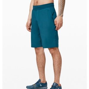 T.H.E SHORT 11” linerless Bermuda Teal